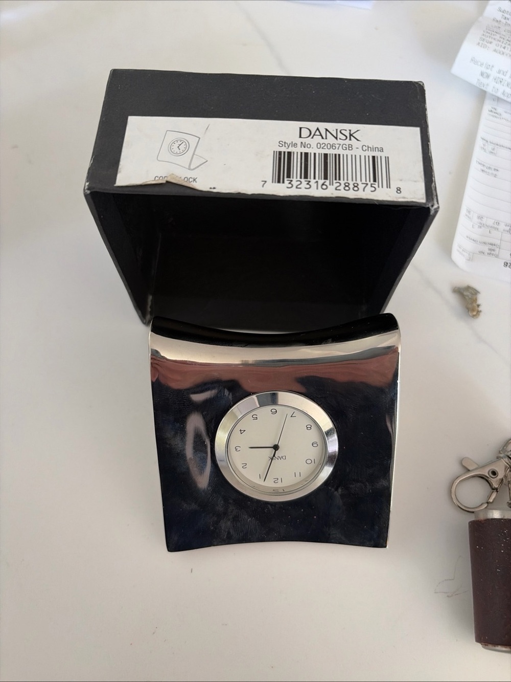 Dansk Silver-Tone Curved Desk Clock with White Dial needs battery